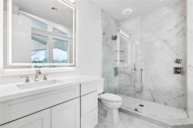 8116 Breakwater Dr, New Orleans, LA 70124 - bathroom with a marble finish shower, vanity, and marble finish flooring