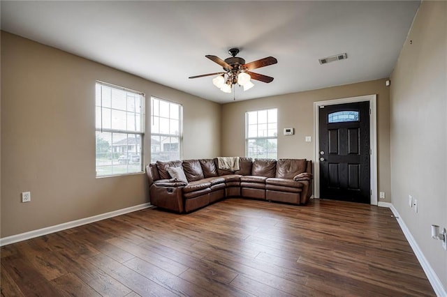 7922 Flounder St, New Orleans, LA 70126 - living room with a ceiling fan and dark wood-style flooring