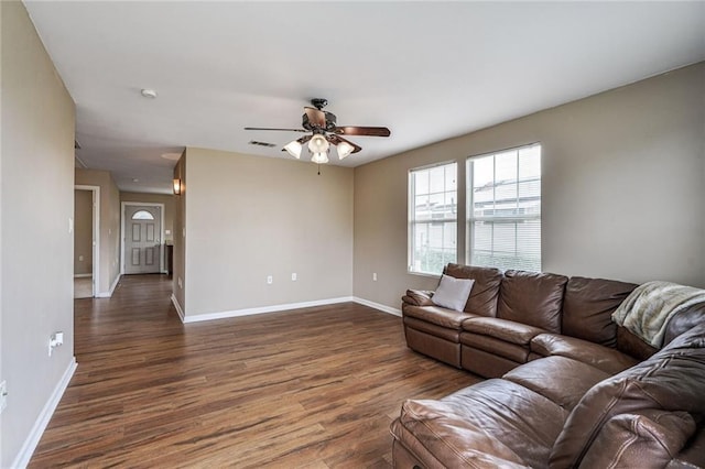 7922 Flounder St, New Orleans, LA 70126 - living area with a ceiling fan and wood finished floors