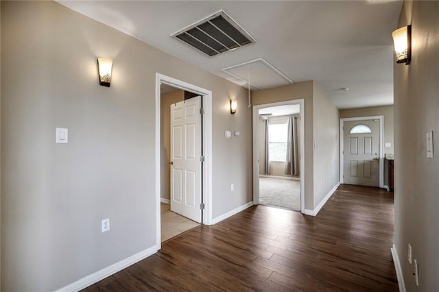 7922 Flounder St, New Orleans, LA 70126 - spare room featuring attic access and wood finished floors