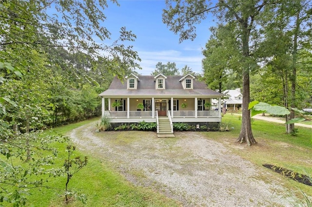 28 Hyacinth Dr, Covington, LA 70433 - view of front of house with a porch, dirt driveway, and stairway