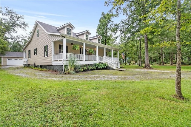 28 Hyacinth Dr, Covington, LA 70433 - view of side of property featuring covered porch, a yard, and a ceiling fan