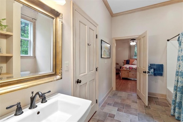 28 Hyacinth Dr, Covington, LA 70433 - ensuite bathroom featuring stone finish floors, ornamental molding, and shower / bath combo