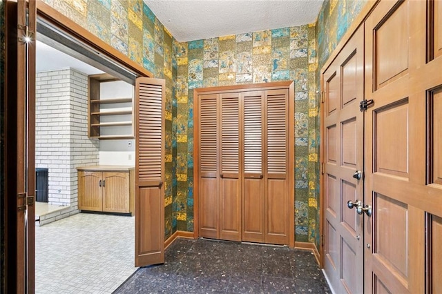 3709 Metairie Hts, Metairie, LA 70002 - interior space with wallpapered walls and a textured ceiling