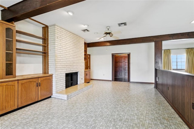 3709 Metairie Hts, Metairie, LA 70002 - unfurnished living room with ceiling fan and a brick fireplace