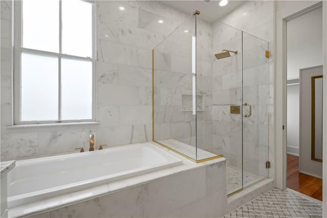 3311 Saint Ann St, New Orleans, LA 70119 - full bath featuring a garden tub and a marble finish shower