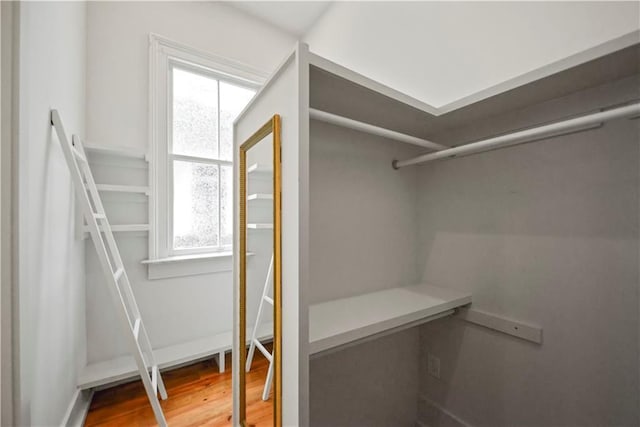 3311 Saint Ann St, New Orleans, LA 70119 - walk in closet featuring wood finished floors