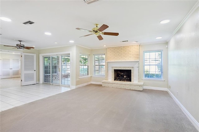 5033 Bissonet Dr, Metairie, LA 70003 - unfurnished living room with ornamental molding, light colored carpet, ceiling fan, plenty of natural light, and recessed lighting