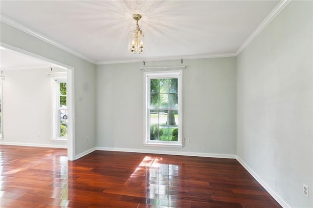 5033 Bissonet Dr, Metairie, LA 70003 - spare room featuring a chandelier, wood finished floors, and ornamental molding