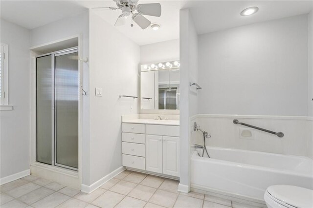 5033 Bissonet Dr, Metairie, LA 70003 - full bath with vanity, a stall shower, tile patterned floors, a garden tub, and a ceiling fan