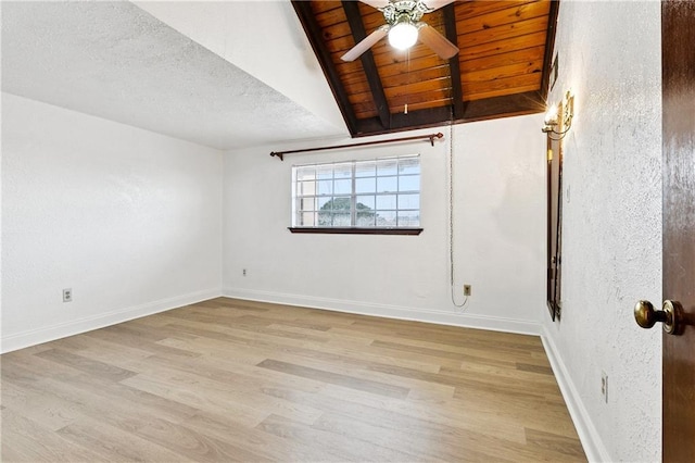 2305 Cleary Ave Unit 214, Metairie, LA 70001 - empty room with wood finished floors, ceiling fan, beam ceiling, and a textured ceiling