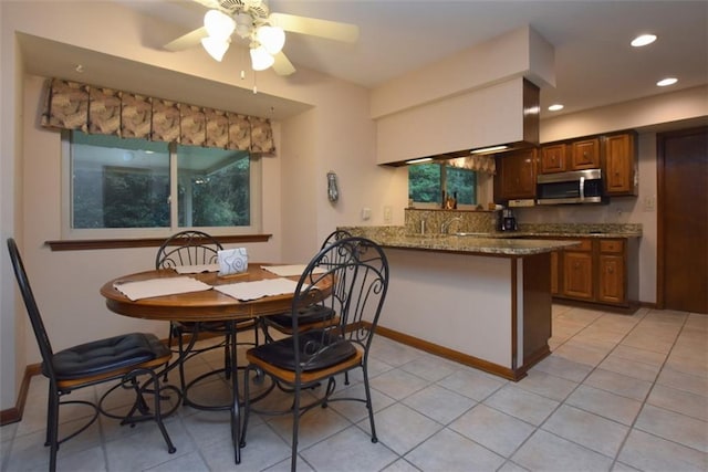 1005 Oakland Dr, Pearl River, LA 70452 - dining room featuring a ceiling fan, recessed lighting, and light tile patterned floors