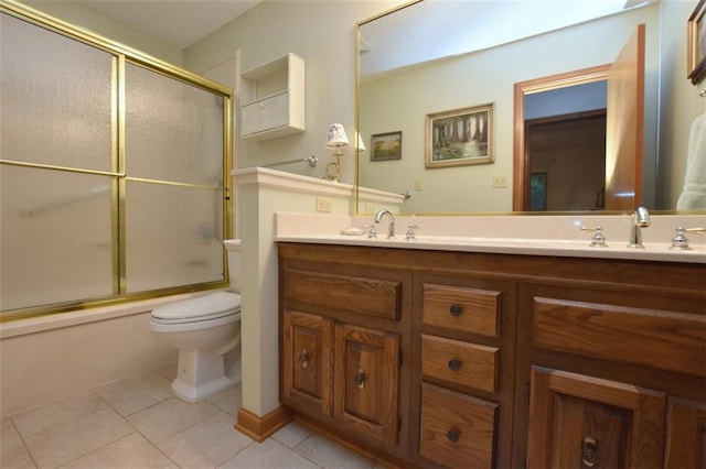 1005 Oakland Dr, Pearl River, LA 70452 - bathroom with tile patterned floors, double vanity, and combined bath / shower with glass door