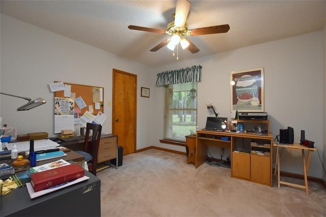 1005 Oakland Dr, Pearl River, LA 70452 - home office featuring light carpet, ceiling fan, and a textured ceiling