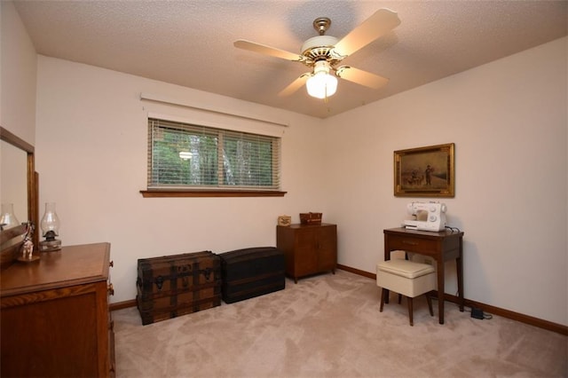 1005 Oakland Dr, Pearl River, LA 70452 - sitting room with light carpet, a ceiling fan, and a textured ceiling