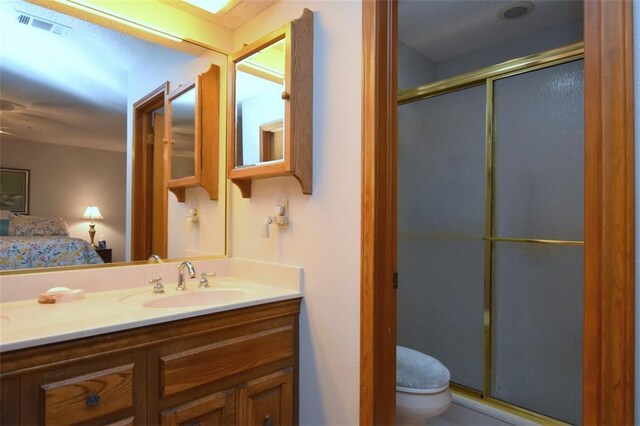 1005 Oakland Dr, Pearl River, LA 70452 - bathroom with connected bathroom, a stall shower, and vanity