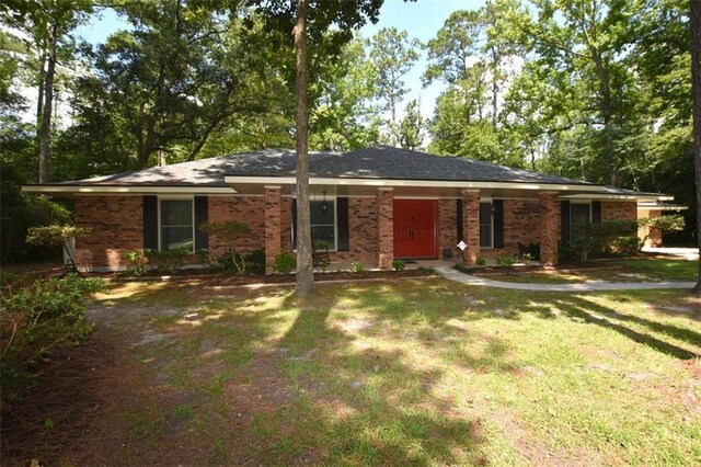 1005 Oakland Dr, Pearl River, LA 70452 - ranch-style house with a front yard and brick siding