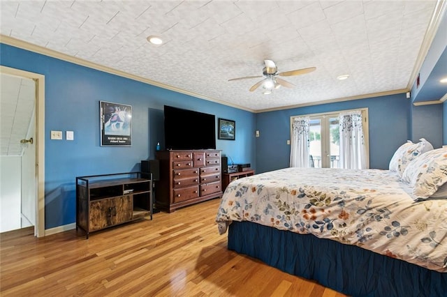 822 Homestead Ave, Metairie, LA 70005 - bedroom featuring french doors, access to outside, wood finished floors, crown molding, and a ceiling fan