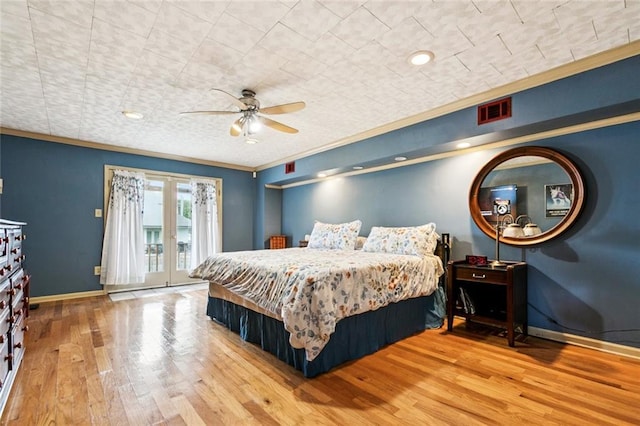 822 Homestead Ave, Metairie, LA 70005 - bedroom with french doors, ornamental molding, wood finished floors, access to exterior, and ceiling fan