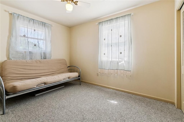 822 Homestead Ave, Metairie, LA 70005 - living area with plenty of natural light and carpet floors