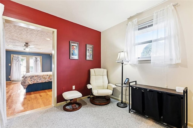 822 Homestead Ave, Metairie, LA 70005 - living area featuring a ceiling fan and carpet flooring
