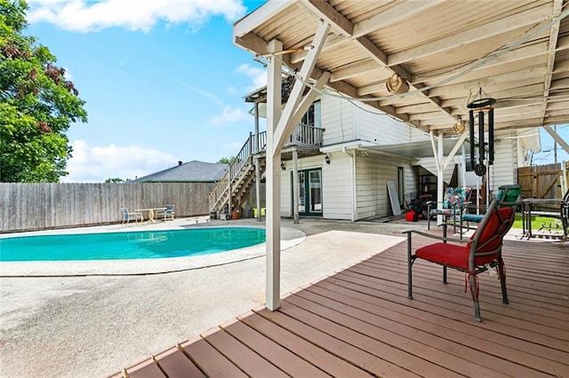 822 Homestead Ave, Metairie, LA 70005 - view of swimming pool with stairs, a deck, a fenced backyard, and a patio