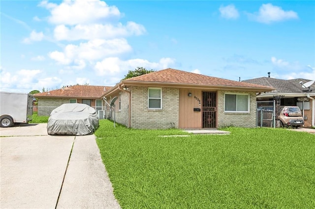 452426 Lafon Dr, New Orleans, LA 70126 - view of front of home with brick siding and a gate