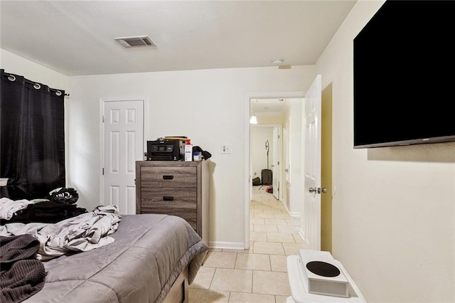 452426 Lafon Dr, New Orleans, LA 70126 - bedroom with light tile patterned flooring and baseboards