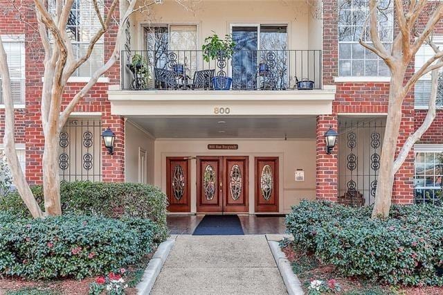 800 Rue Burgundy St Unit 223, Metairie, LA 70005 - property entrance featuring brick siding and stucco siding
