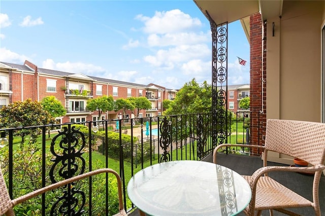 800 Rue Burgundy St Unit 223, Metairie, LA 70005 - balcony featuring view of pool and a residential view