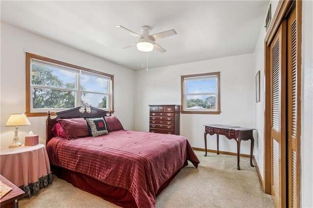 6213 Rosalie Ct, Metairie, LA 70003 - carpeted bedroom featuring a closet and ceiling fan