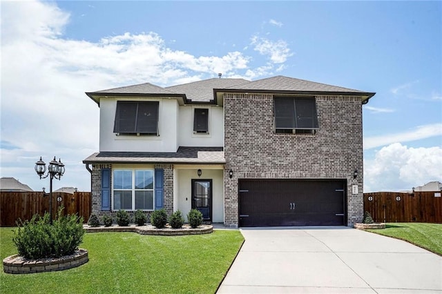 801 Lakeshore Village Dr, Slidell, LA 70461 - view of front facade featuring an attached garage, driveway, stucco siding, and brick siding