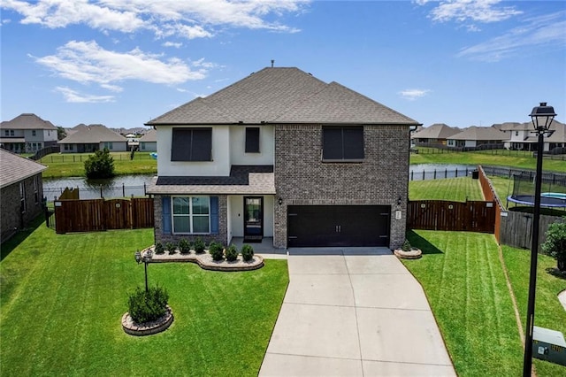 801 Lakeshore Village Dr, Slidell, LA 70461 - view of front of house featuring concrete driveway, brick siding, a garage, and a residential view