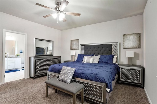 801 Lakeshore Village Dr, Slidell, LA 70461 - carpeted bedroom featuring ensuite bathroom and ceiling fan