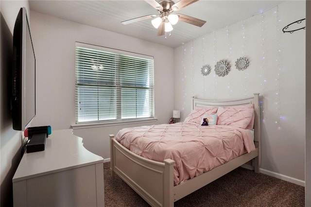 801 Lakeshore Village Dr, Slidell, LA 70461 - carpeted bedroom with ceiling fan and baseboards