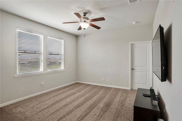 801 Lakeshore Village Dr, Slidell, LA 70461 - spare room with carpet floors and a ceiling fan