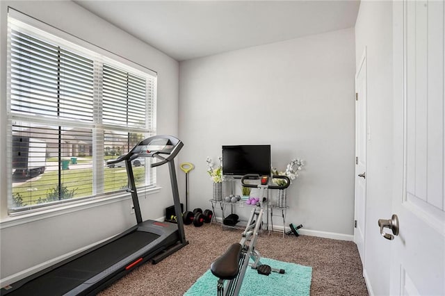 801 Lakeshore Village Dr, Slidell, LA 70461 - exercise area with plenty of natural light and carpet