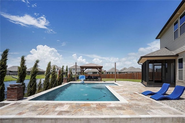 801 Lakeshore Village Dr, Slidell, LA 70461 - view of swimming pool with a gazebo, a sunroom, a residential view, and a patio