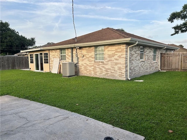 532 Deerfield Rd, Terrytown, LA 70056 - rear view of house with a fenced backyard and brick siding