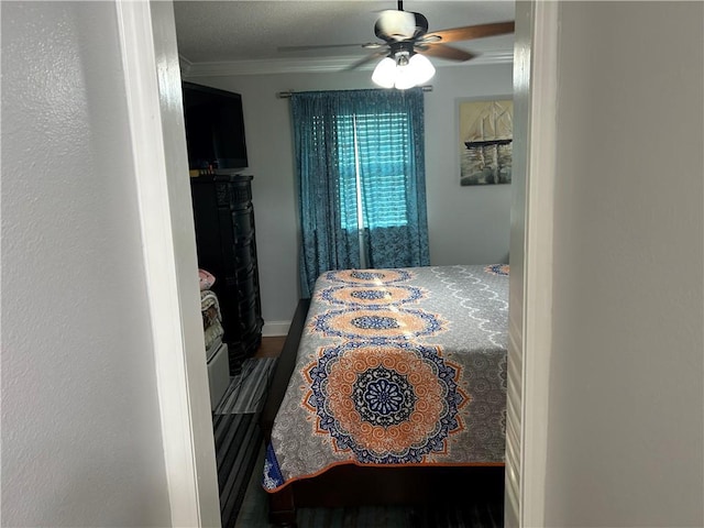 532 Deerfield Rd, Terrytown, LA 70056 - bedroom with ornamental molding and a ceiling fan