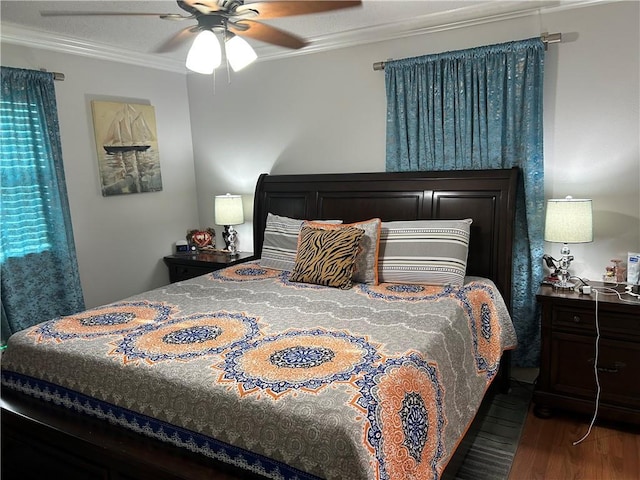 532 Deerfield Rd, Terrytown, LA 70056 - bedroom with ornamental molding, wood finished floors, and a ceiling fan