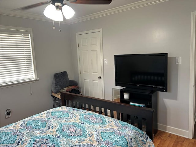 532 Deerfield Rd, Terrytown, LA 70056 - bedroom featuring light wood-style flooring, ornamental molding, and ceiling fan