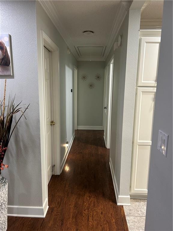 532 Deerfield Rd, Terrytown, LA 70056 - corridor featuring attic access, wood finished floors, and crown molding