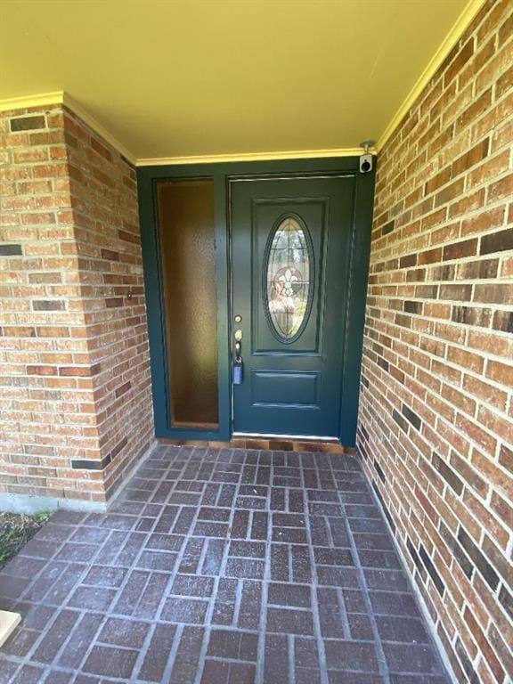 1411 Patriot St, Slidell, LA 70458 - view of exterior entry featuring brick siding