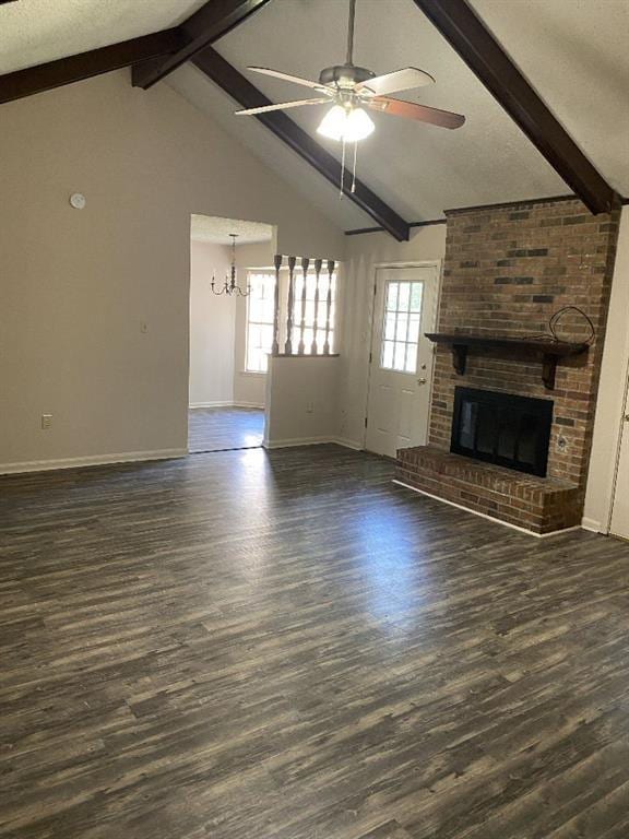 1411 Patriot St, Slidell, LA 70458 - unfurnished living room featuring wood finished floors, ceiling fan, a chandelier, and a brick fireplace