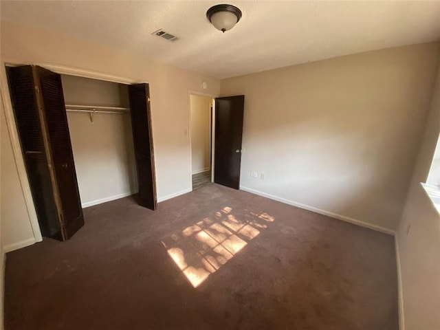 1411 Patriot St, Slidell, LA 70458 - unfurnished bedroom with carpet flooring and a closet