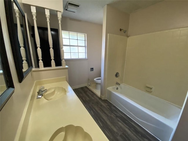 1411 Patriot St, Slidell, LA 70458 - full bathroom featuring wood finished floors, shower / tub combination, and vanity