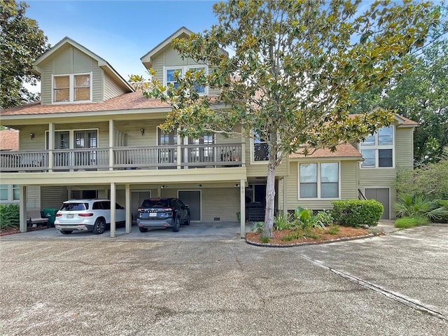 60 Chamale Cv Unit 60, Slidell, LA 70460 - multi unit property featuring a shingled roof and covered parking