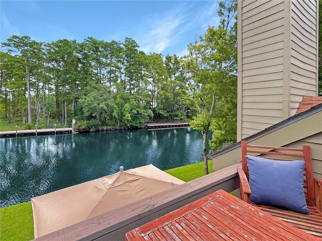 60 Chamale Cv Unit 60, Slidell, LA 70460 - dock area featuring a water view and view of scattered trees