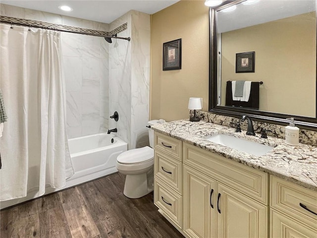 60 Chamale Cv Unit 60, Slidell, LA 70460 - full bathroom featuring vanity, shower / bath combo with shower curtain, and wood finished floors